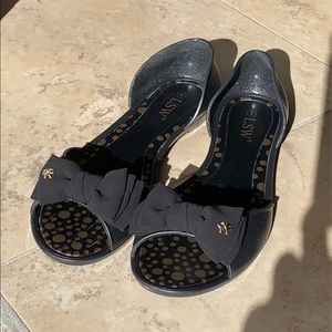 Black Jelly slip-ons - size 9